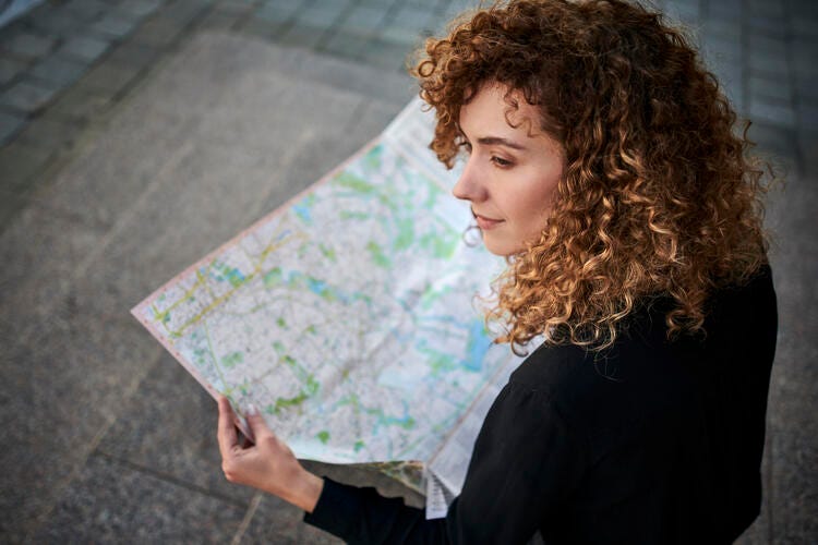 a person holding a map